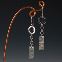  Swingy Silver And Chain Earrings 